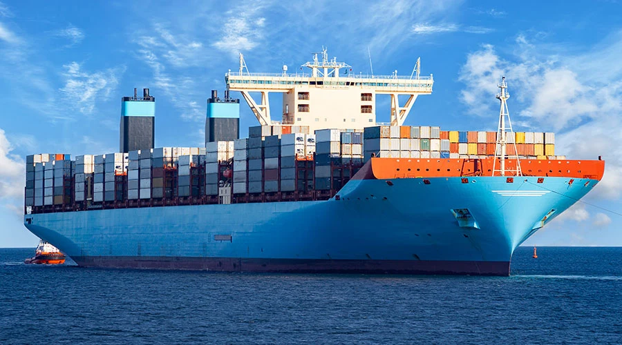 Container ship at sea — Munawla shipping agency